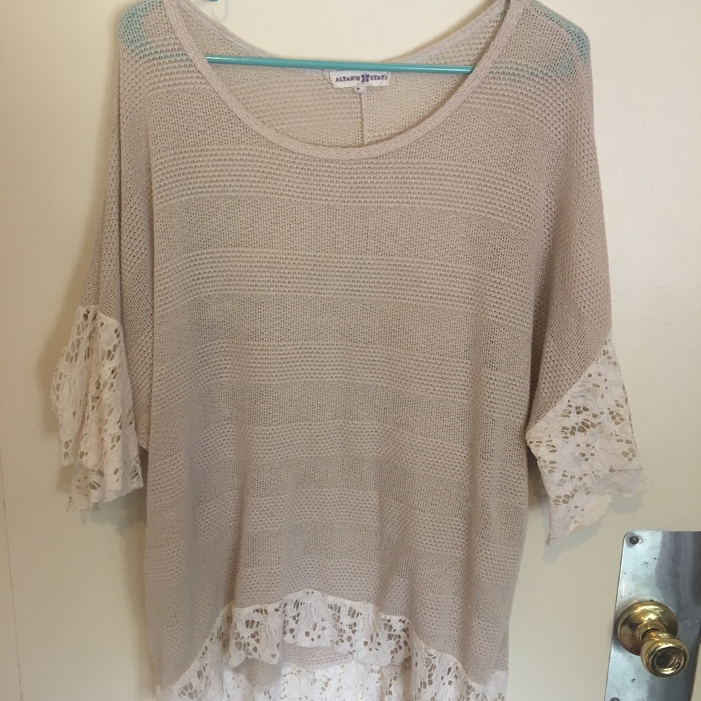 Top with lace sleeve and bottom detail